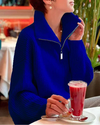 A relaxed fit allows for easy movement, while the turn-down collar and zipper detail keep the look intentional. 