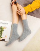 Women's Rabbit Hair wool thermal socks featuring a sculpted mid-tube cuff, angora lining, and plush blend fabric, perfect for delivering poised warmth in cold office environments.