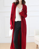 Longline open-front cardigan in 100% heavyweight wool. Regular fit, solid colour, slight stretch — warm and elegant for autumn and winter.