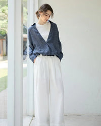 Linen Deep V-Neck Shirt Paired With A White Vest