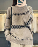 100% wool solid striped spliced round neck oversized knit pullover. Warm, heavyweight, and relaxed fit — a cosy casual winter knitwear top for women.