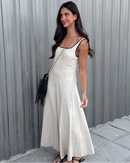 Sleeveless square neck maxi dress with backless zipper closure and slim A-line fit. Lightweight polyester — chic holiday and occasion style for spring and summer.