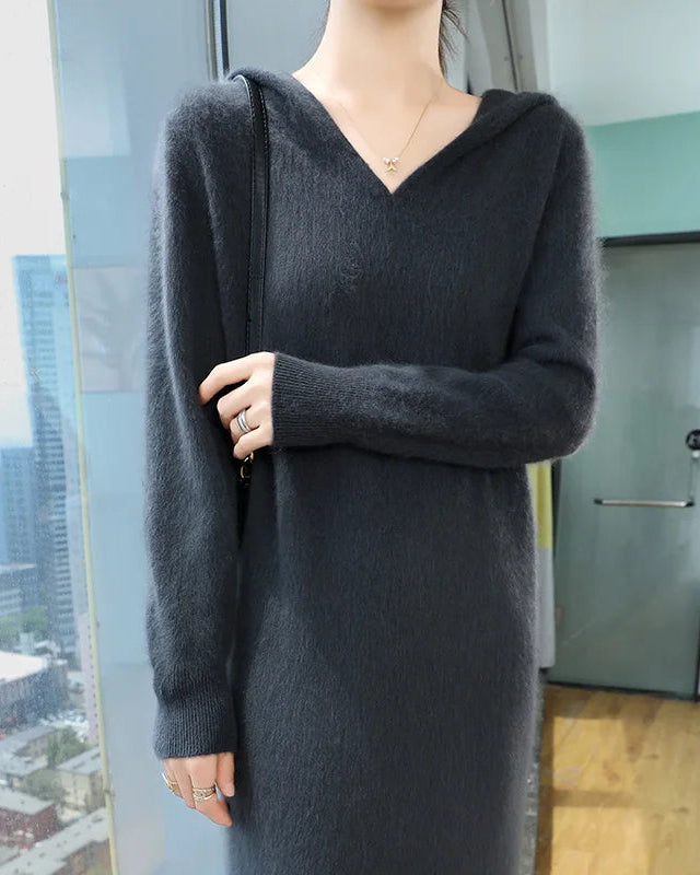 This mink cashmere hooded dress is a study in quiet luxury. The relaxed fit moves freely with the body.