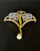 Vintage butterfly fairy brooch with tassel in gold tone, whimsical metal pin featuring detailed wings and dangling fringe, perfect for boho or elegant styling.