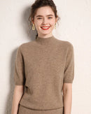 A cashmere half-sleeve mock-neck sweater with mock neck, half sleeves, regular fit and stretch, designed for a cozy winter layering look that pairs from sneakers to boots.