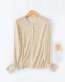 Women's loose-fitting crew-neck single-breasted cardigan, featuring a relaxed silhouette and classic knit design for effortless spring and summer layering.