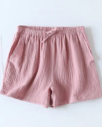 Women's Cotton Solid drawstring lounge shorts crafted for breathable comfort, featuring a relaxed silhouette and lightweight crepe fabric that moves seamlessly from dawn lounging to dusk unwinding.