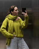 A Loose Soft V-Neck Sweater With A Scarf