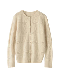 A 100% Australian merino wool openwork cardigan with an O-neck and button front, designed for poised vintage warmth that layers easily from commute to dinner.