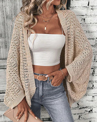 Solid hollow-out batwing sleeve open-front loose knit cardigan. Lightweight, medium stretch, and relaxed — a casual all-season layering sweater for women.
