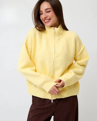 A clean stand collar and full-zip closure give it a structured silhouette, while the relaxed fit ensures all-day comfort. Ideal for transitional seasons.
