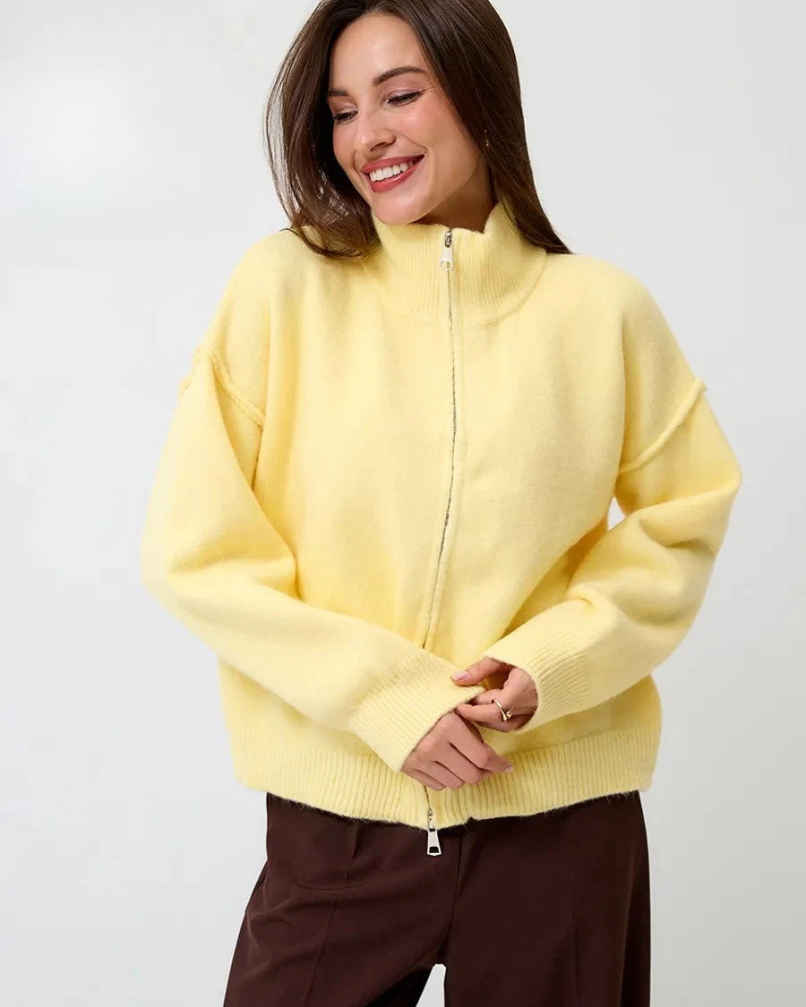 A clean stand collar and full-zip closure give it a structured silhouette, while the relaxed fit ensures all-day comfort. Ideal for transitional seasons.