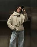 A Loose Soft V-Neck Sweater With A Scarf