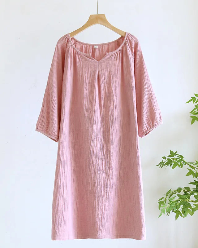 Women's Cotton crepe solid nightgown featuring a soft round neck and quarter sleeves, crafted for breathable comfort with a relaxed A-line silhouette that moves seamlessly from quiet evenings to restful mornings.