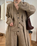 V-neck long sleeve knit coat, single-breasted vest, and high waist wide-leg trouser 3-piece set. Cotton-polyester knit — elegant casual style for autumn and winter.