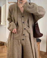 V-neck long sleeve knit coat, single-breasted vest, and high waist wide-leg trouser 3-piece set. Cotton-polyester knit — elegant casual style for autumn and winter.