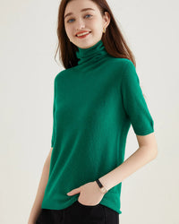 A merino wool half-sleeve turtleneck with turtleneck, half sleeves, seamless construction and regular fit, designed for a cozy winter layering look that pairs from sneakers to boots.