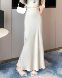 Women's Satin high-waist midi skirt crafted from an acetate and silk blend, featuring a fluid mermaid silhouette and double-stitched seams for elegant drape from office commute to evening dining.