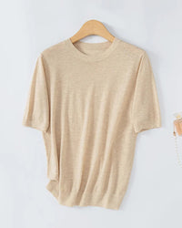 Women's lightweight worsted wool blend crew-neck short-sleeve pullover, featuring a fine yarn knit and A-line silhouette for effortless spring and autumn layering.