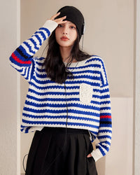 The Stripe Knit Crewneck Pullover. A relaxed, slightly stretchy knit sweater designed for effortless everyday style.