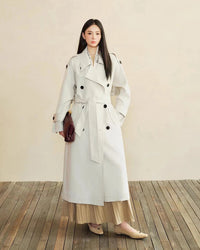 Understated in design, powerful in presence — this oversized trench coat is a wardrobe cornerstone across every occasion. 