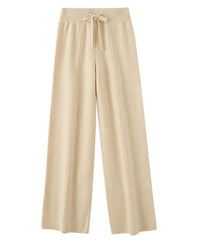 Merino wool wide-leg trousers featuring a lace-up mid-seam detail, an elastic waist, and a seamless knit for a soft, elegant silhouette.