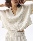 Women's cotton oversized V-neck tee, featuring breathable cotton and a relaxed silhouette for effortless laid-back cool from weekend brunch to city stroll.