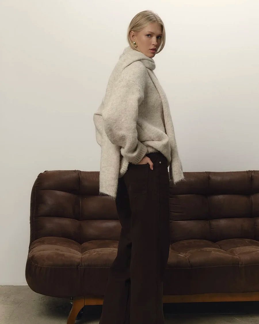 A Loose Soft V-Neck Sweater With A Scarf