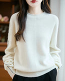 A rolled-neck merino wool sweater with rolled mock neck, ribbed cuffs, regular fit, long sleeves and stretch, designed for a cozy winter layering look that pairs from sneakers to boots.