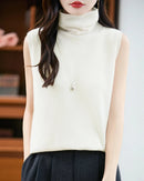Wool turtleneck sleeveless knit vest. Regular fit, slight stretch, medium weight.
