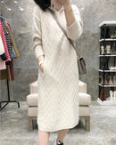 Cable-knit cashmere hooded sweater dress for women with diamond texture, hood, and front patch pockets, a warm fall-winter pullover dress for casual everyday wear.