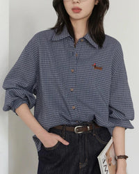 The single-breasted closure, turn-down collar, and relaxed shape create an effortless balance of structure and ease, while the smooth fabric sits comfortably through the day.