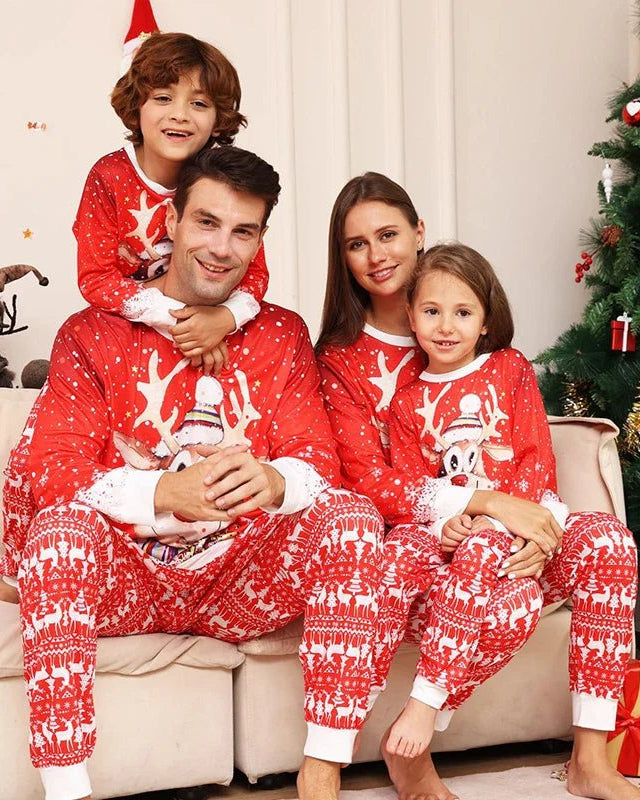Red family Christmas matching pajamas set featuring a festive reindeer and snowflake pattern. This unisex polyester sleepwear set includes long-sleeved tops and pants for dad, mom, kids, and babies, perfect for creating a cozy holiday look.