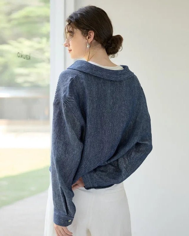 Linen Deep V-Neck Shirt Paired With A White Vest