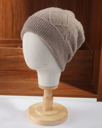 Diamond-knit wool beanie with raised diamond motifs, ribbed turn-up cuff and rounded shaped crown, a cozy solid fall-winter wool hat for commuting or weekend walks.