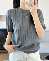 Ribbed cotton short-sleeve top — a relaxed, breathable knit essential designed for effortless warm-weather style.