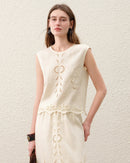 Women's Linen cut-out embroidered sleeveless top crafted from 100% breathable linen, featuring delicate artisan details and an O-neck silhouette for poised ease from beach lounging to resort dining.