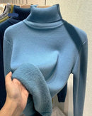 A thick velvet-lined turtleneck pullover with turtleneck collar, velvet lining and regular fit, designed for a cozy winter layering look that pairs from sneakers to boots.