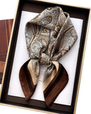 The floral pattern — intricate, layered, and quietly decorative — works equally well tied at the neck, woven through the hair, or knotted at a bag handle.