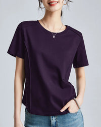 Cotton elastane knit crew neck t-shirt with clean round neck and sculptural raised stitching. True to size. Effortless summer style.