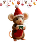 This felt mouse ornament pairs a tactile surface with an expressive face and charming seasonal attire.