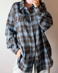 Oversized plaid shirt for women. Relaxed fit, turn-down collar, functional pockets — effortless style for office or weekend wear.