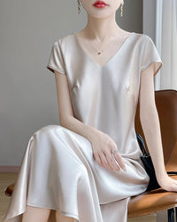 The Women's Satin V Neck Slip Dress. A fluid, relaxed A-line maxi in silky satin — effortlessly elegant for spring and summer.
