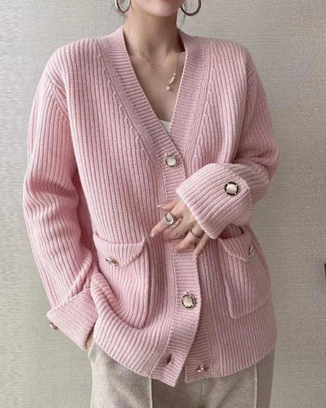 Women's Ribbed knitted cardigan featuring a classic V-neckline, single breasted closure, and functional pockets, perfect for vintage-inspired indoor layering and cool evening comfort.