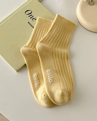 These ankle socks strike the perfect balance between softness and structure. A fine-knit cotton blend hugs the foot without constriction.