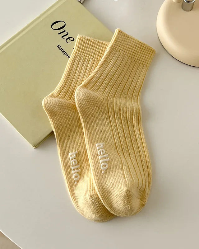 These ankle socks strike the perfect balance between softness and structure. A fine-knit cotton blend hugs the foot without constriction.