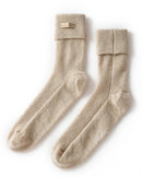 Women's Pure Cashmere lounge mid-calf socks featuring a sculpted ribbed cuff, thick high-elasticity knit, and double-stitched seams, perfect for delivering poised warmth at home.