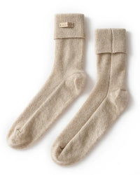 Women's Pure Cashmere lounge mid-calf socks featuring a sculpted ribbed cuff, thick high-elasticity knit, and double-stitched seams, perfect for delivering poised warmth at home.