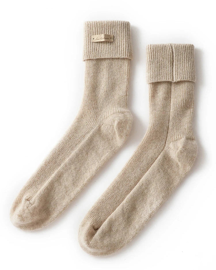 Women's Pure Cashmere lounge mid-calf socks featuring a sculpted ribbed cuff, thick high-elasticity knit, and double-stitched seams, perfect for delivering poised warmth at home.