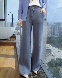 Mink cashmere knit wide leg pants with a high drawstring waist and deep pockets, designed for soft office-ready warmth from desk to dinner.